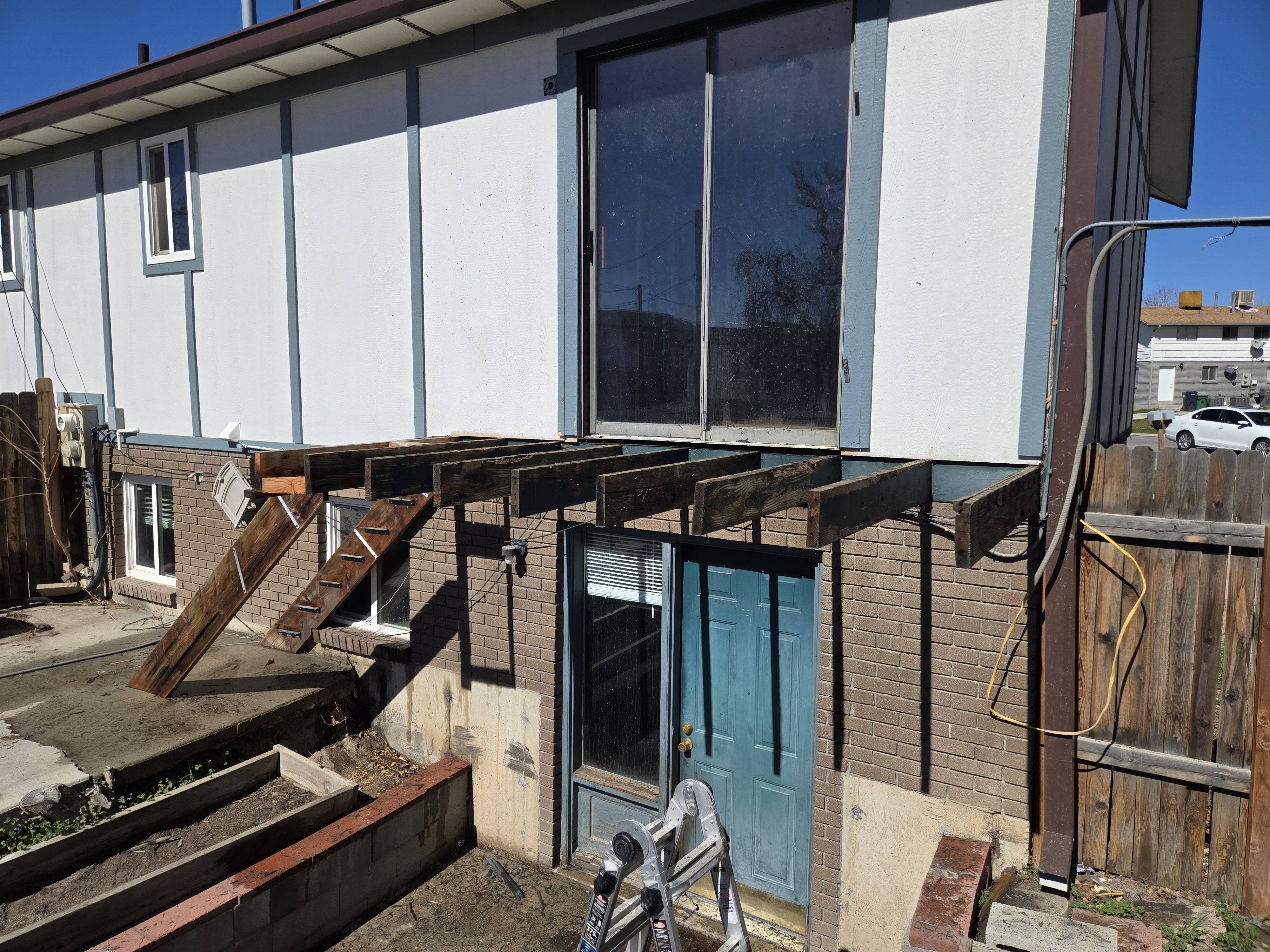Carmen Court deck before — stripped framing