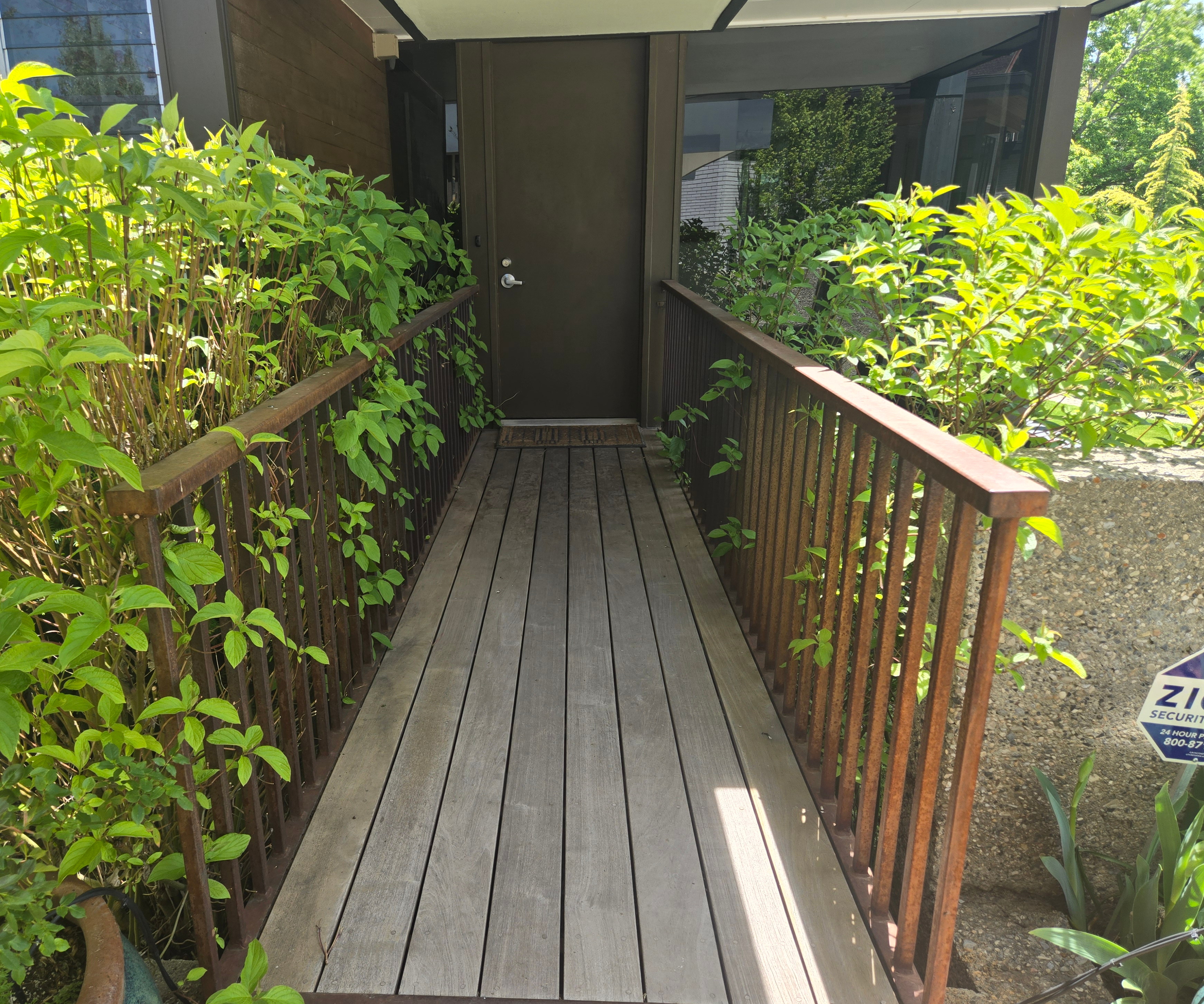 Ipe deck before power washing — grey weathered wood